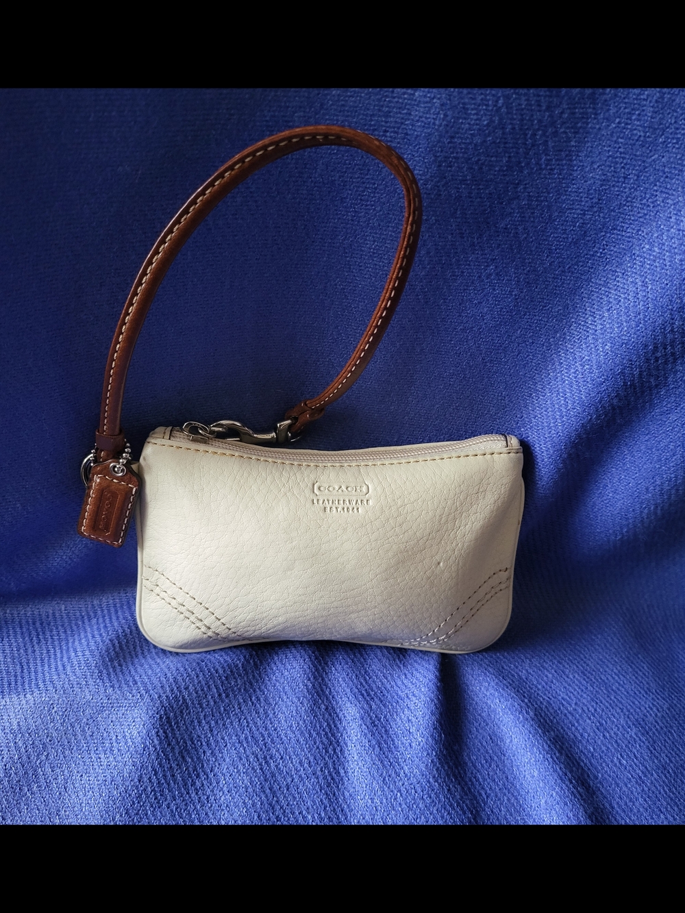 Coach Cream Pebbled Leather Wristlet with Brown Strap
